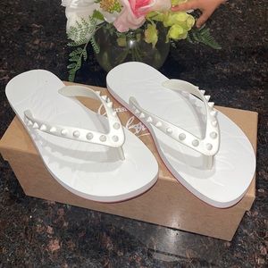 Beautiful Authentic Christian Louboutin thong sandals.